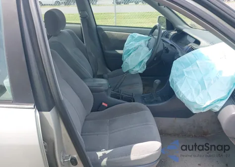 2001 Toyota Camry Ce z USA, uszkodzony, nr VIN 4T1BG22K61U087634